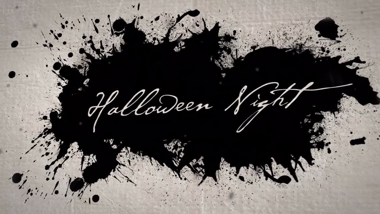 Animazione della scritta Halloween su una macchia nera su sfondo beige.