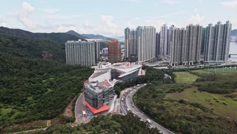 aerial drone shot over shaw studio, tv broadcast studio in tseung kwan o, hong kong, china