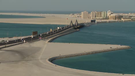 a long and high shot of the king hamad causeway linking the capital manama and the island of muharraq.