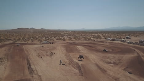 aerial view, utv racer catching air on jump, slowmo