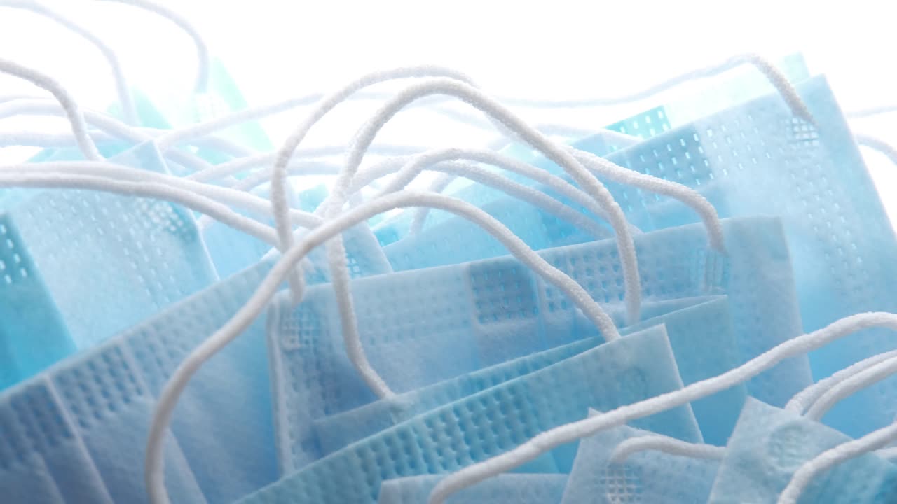 파란색 수술 마스크의 어리