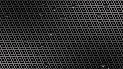 circle perforated sheet metal with drops of water video