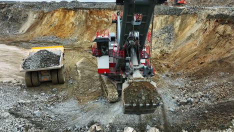 large excavator in an open pit mine