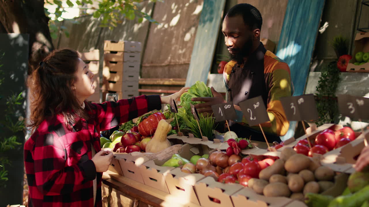 People buying fresh produce at a farmer's market