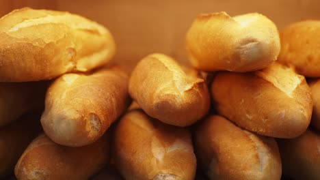 a stack of freshly baked baguettes