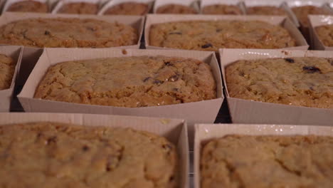 Golden-cakes-in-cardboard-ready-to-be-packaged-and-labelled