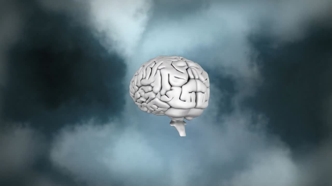 icono del cerebro humano girando contra el efecto del humo en un fondo gris