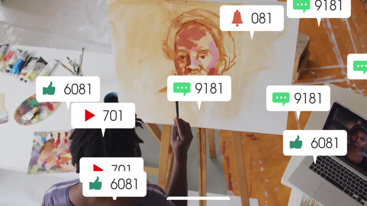 animación de iconos de las redes sociales en vista aérea de un artista afroamericano pintando en el estudio
