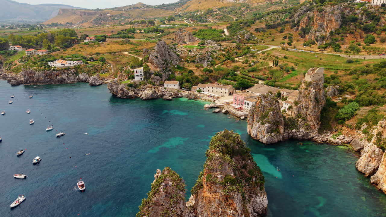 Turquoise waters in the Italian mediterranean town of Scopello