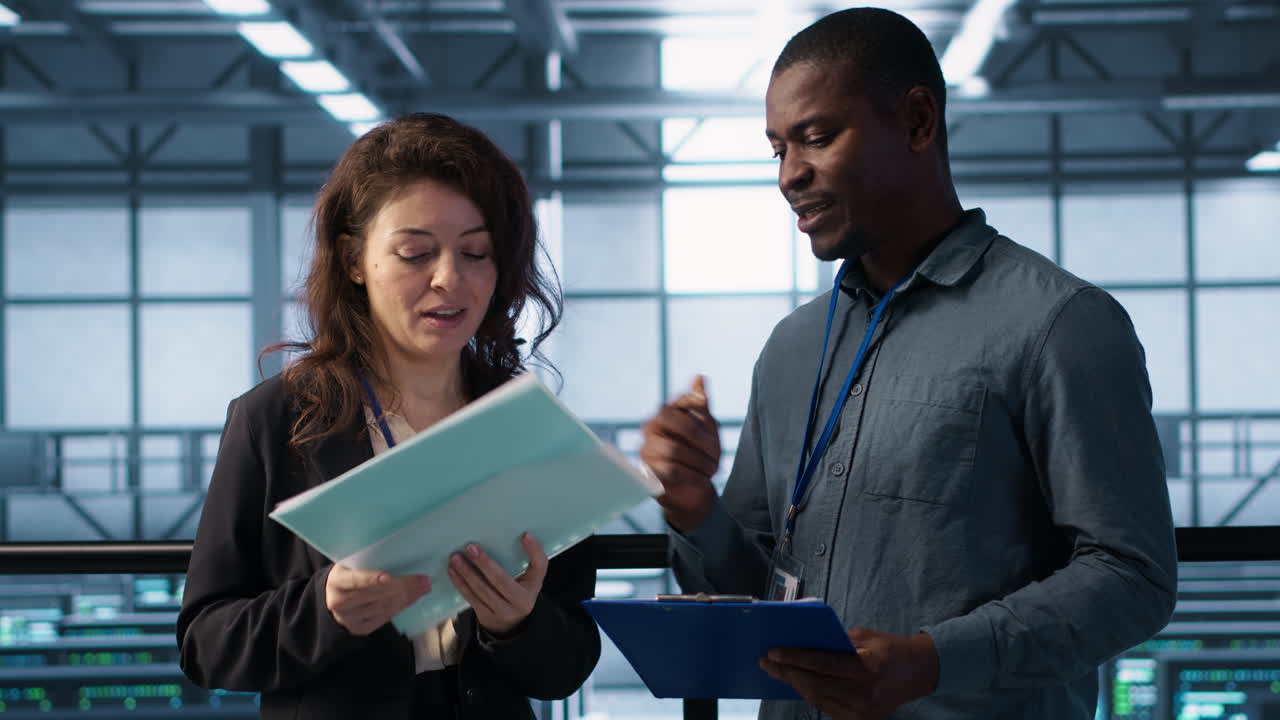 Data center management executives reading paperwork files