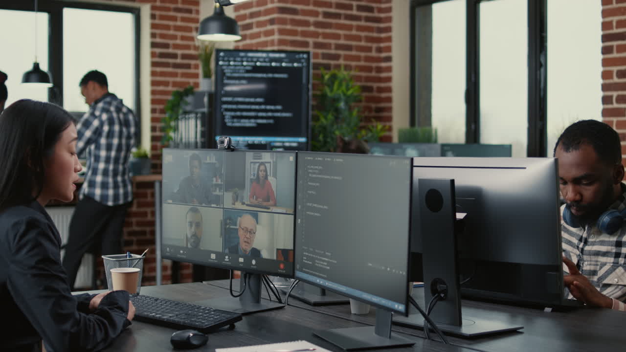 Software company employee in video call conference with client team discussing coding project