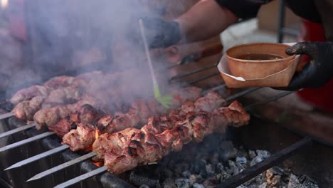 grilled pork skewers on charcoal grill