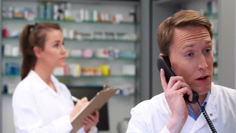 pharmacist talking on the phone