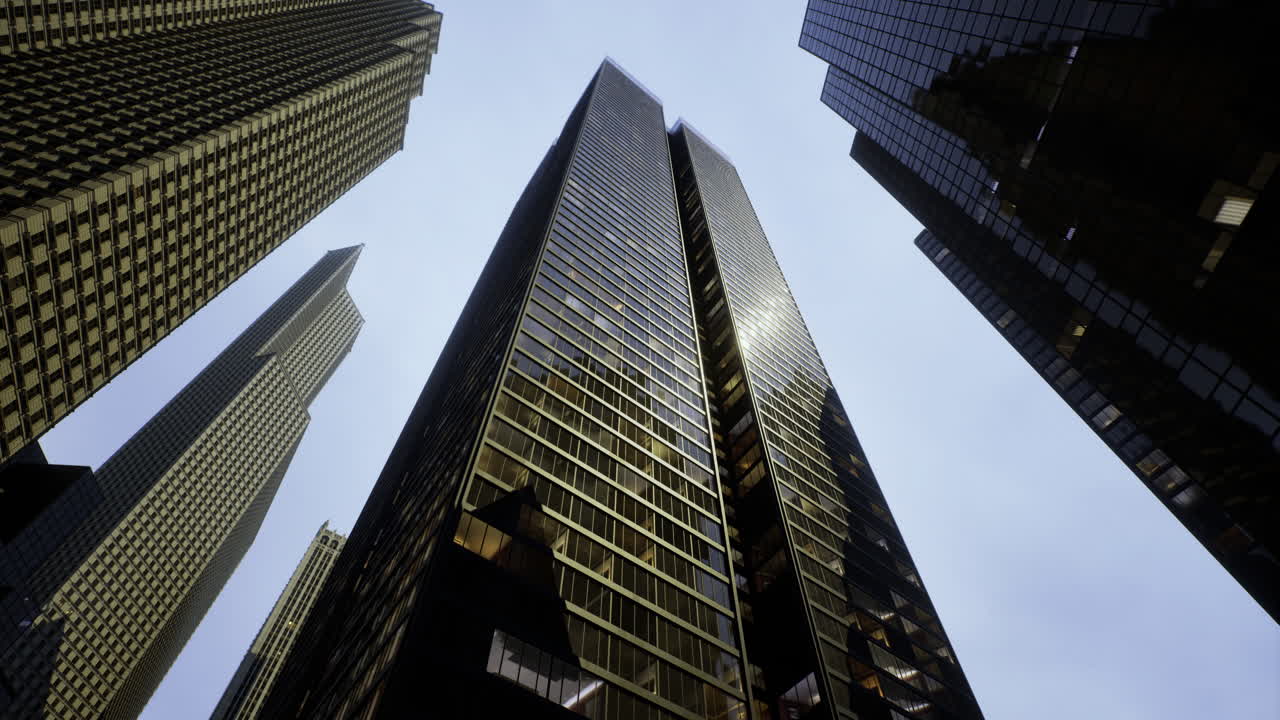 Modern skyscrapers reach for the sky in an urban landscape during daytime