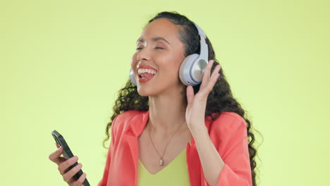 headphones, smartphone and woman dancing