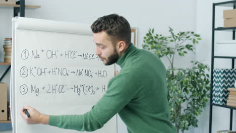 chemistry class - equations on whiteboard