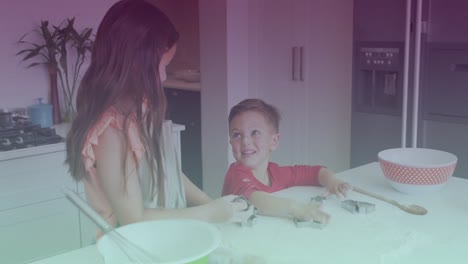 spots of light against caucasian brother and sister talking to each other in the kitchen