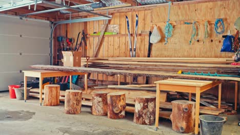 a rustic wooden bench made using live edge planks and log stumps for legs - static shot