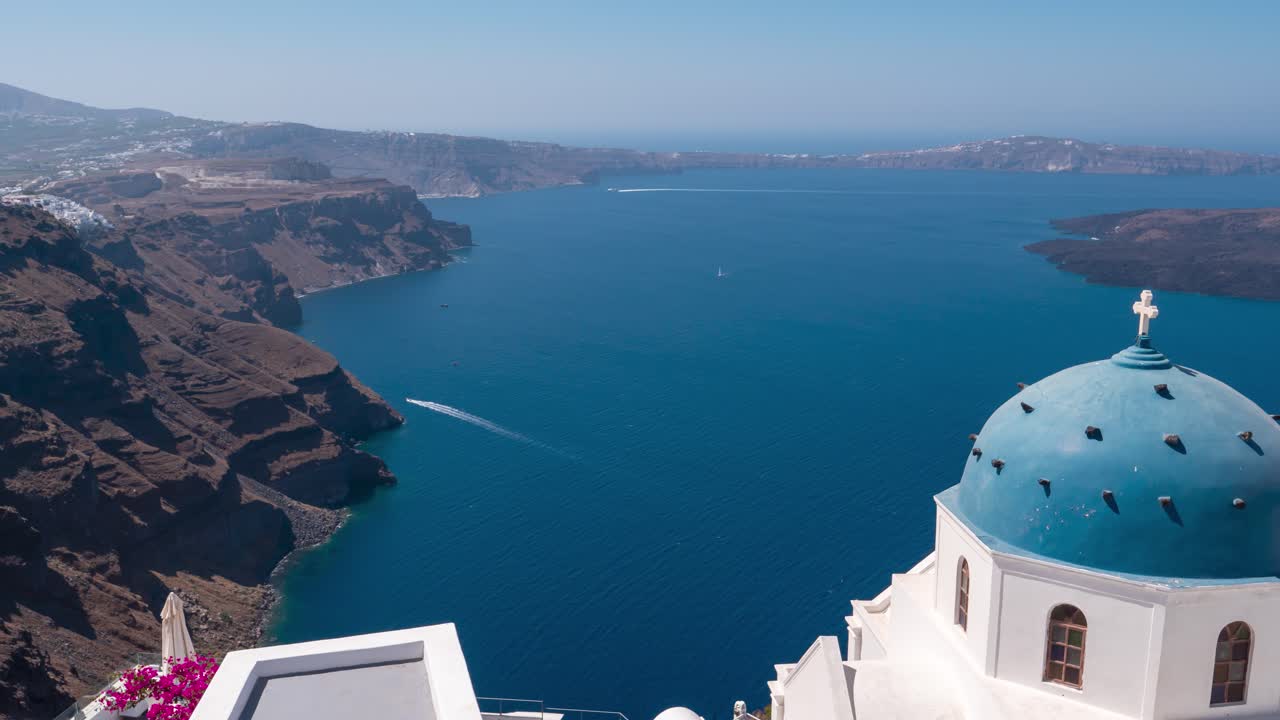 Santorini Greece Timelapse, blue rooftop church and boats in the bay