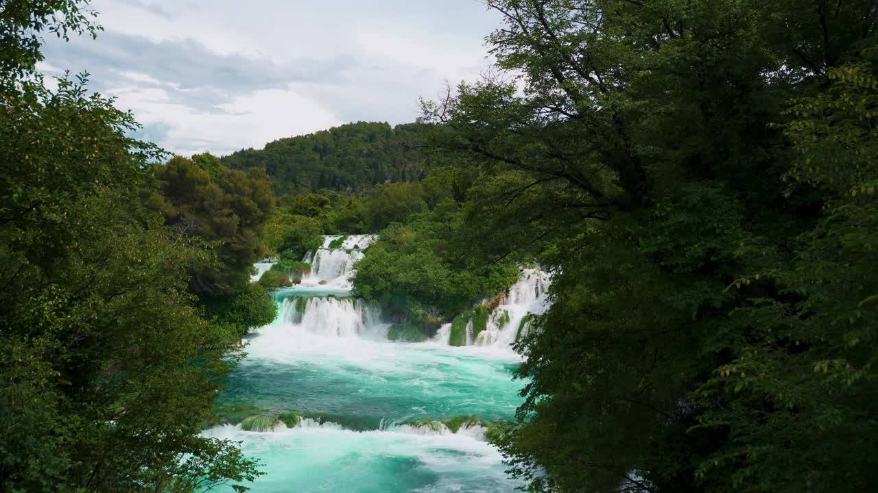 Cascading waterfalls and turquoise clear water pools in Krka National Park, Dalmatia, Croatia