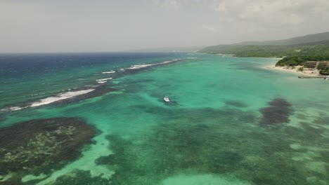 Slow-panning-Beautiful-aerial-shot-of-blue-sky-turquoise-water-in-st