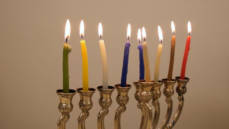Jewish Chanukiah with burning candles celebrating the Hanukkah holiday