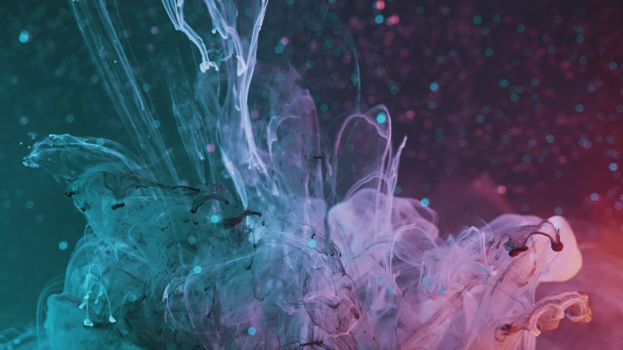 explosión de humo coloreado con brillos - concepto de nebulosa cósmica