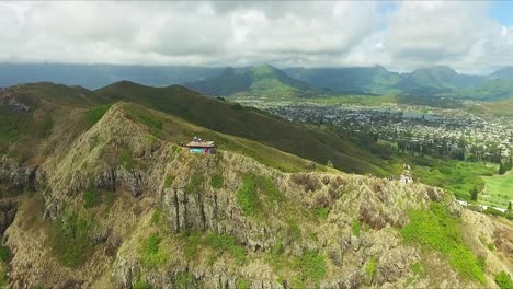 pullback aerial view of lanikai pillbox on oahu hawaii on a sunny day