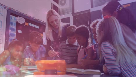 animation of light spots over diverse schoolchildren and female teacher