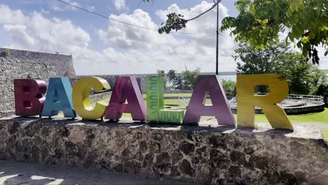 vibrant multi colored photo op sign art installation for bacalar mexico