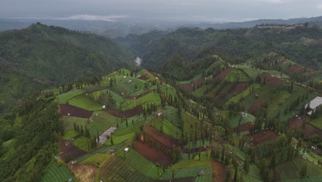 aerial drone view of rural hills mountains countryside in east java indonesia
