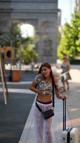 young woman traveling in a city park