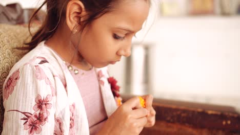 portrait of an indian child at home during coronavirus lockdown