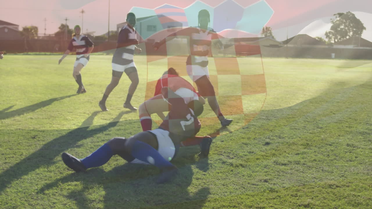 On field, rugby players tackling with animation of shield overlay appearing