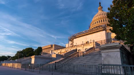 time lapse of the west entrance of the us capitol while under repair and blue skies