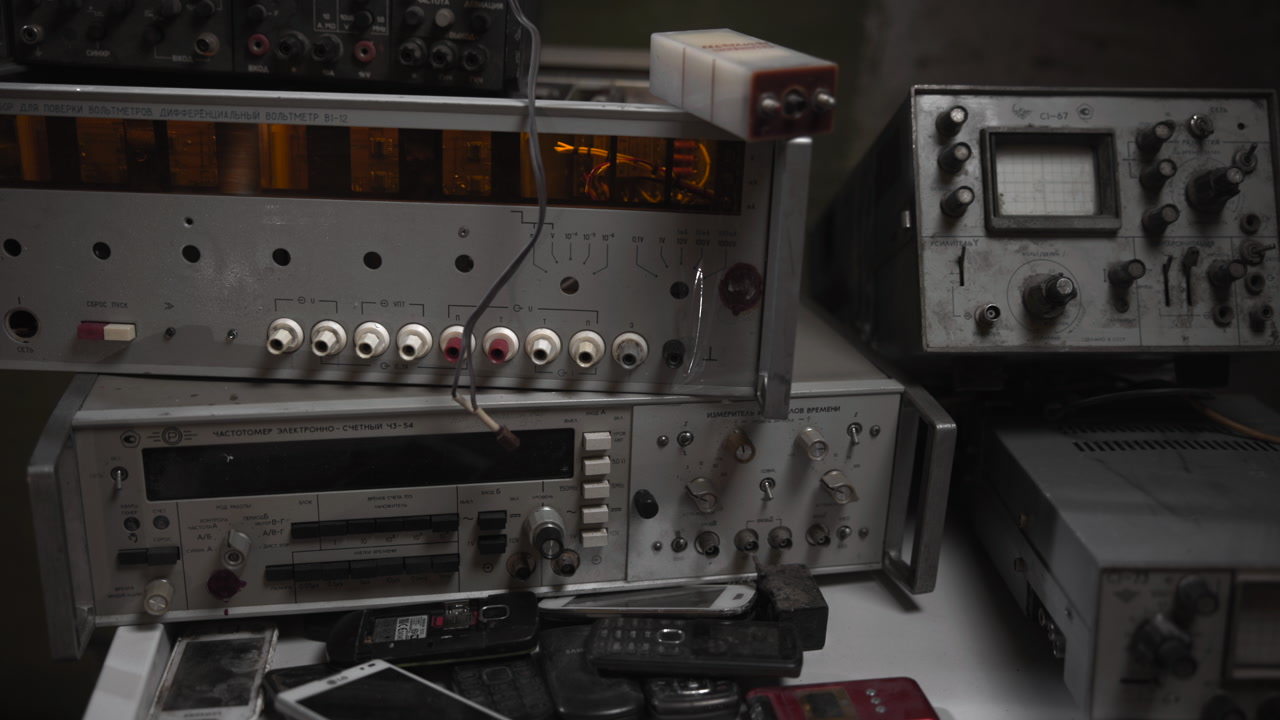 Retro Audio Rack And Connector Panel, Cluttered Bench With Rca Jacks, Handheld Phones And Cassette Deck Evokes . Media