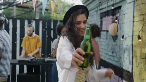 friends dancing at an outdoor party