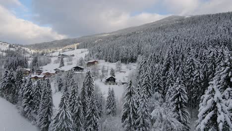 Aerial-shot-of-a-snow-covered-mountain-town