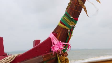 flowers and colorful ribbons part of buddhist culture asking for blessing of fishermen