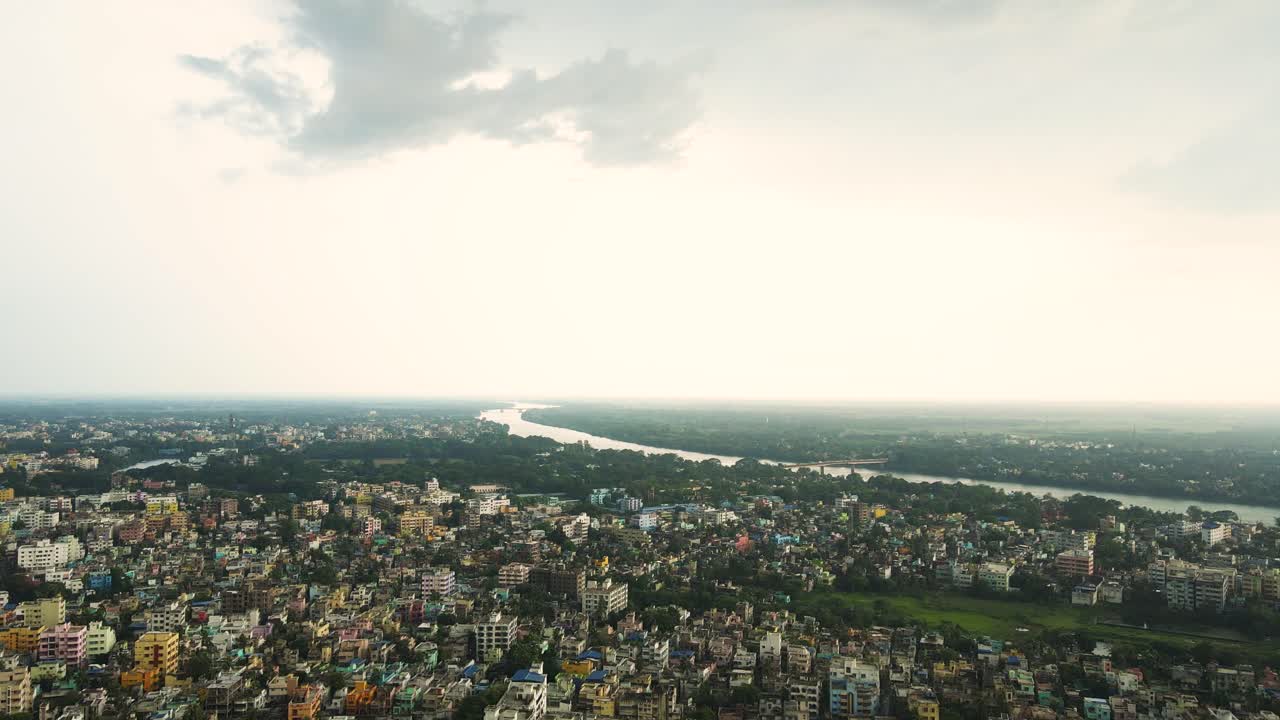 Panoramic drone shot of Murshidabad, with its architectural gems set against the backdrop of the river.
