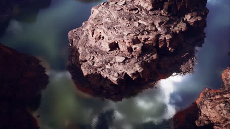 aerial view of a deep canyon with a rocky cliff