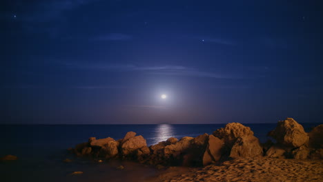 Epic-Moon-Rising-Over-The-Sea-There-Is-A-Moon-Track-Stars-And-Falling-Meteorites-4k-Timelapse-Video