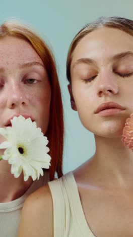 two women with flowers