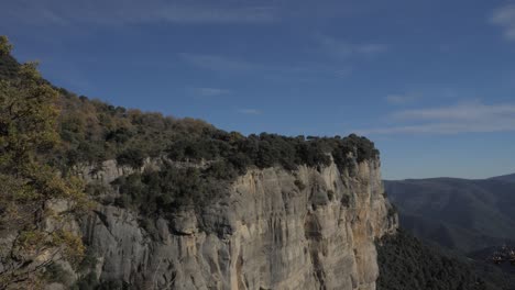 Big-hill-with-bluw-sky-and-small-white-clouds