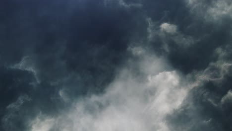 4k-lightning-flashes-among-dark-and-moving-cumulonimbus-clouds,-thunderstorm