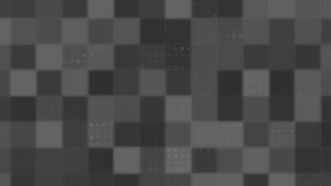 animación de cuadrados grises de una placa de circuito integrado de un procesador de ordenador sobre un fondo negro.