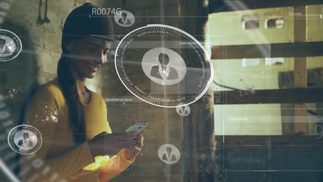 animación de procesamiento de datos con iconos sobre mujer biracial usando teléfono inteligente