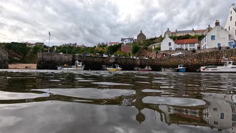 scenic view of boats and coastal village