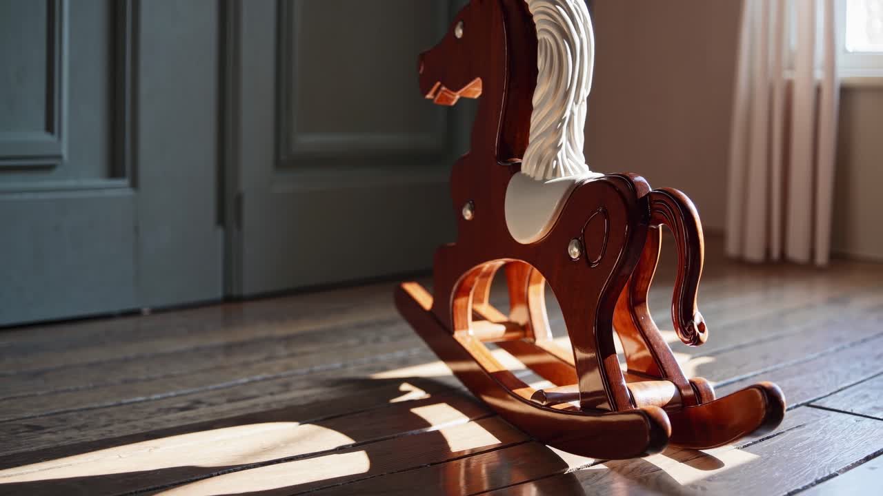 Warm, nostalgic video concept featuring a wooden rocking horse in soft focus