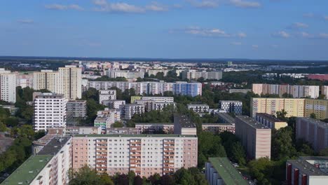 Marvelous-aerial-top-view-flight-Large-panel-system-building-Apartment,-prefabricated-housing-complex,-Berlin-Marzahn-East-German-summer-2023